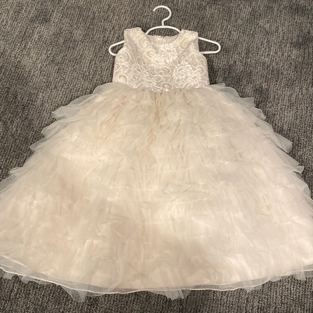 Beautiful flower girl dress worn once! Crème lace top + ruffled crinoline skirt.